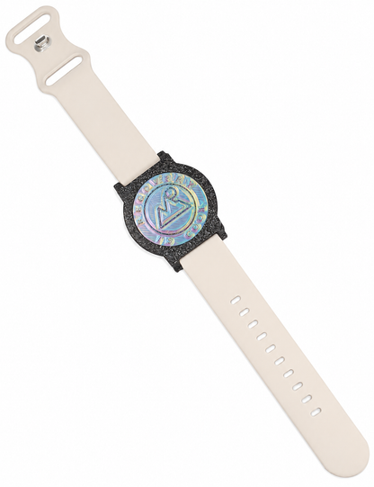Recovewrist milestone band in stone beige, worn watch-style with the iridescent ‘Recovery Is Cool’ recovery coin in a speckled granite bezel — made in Colorado