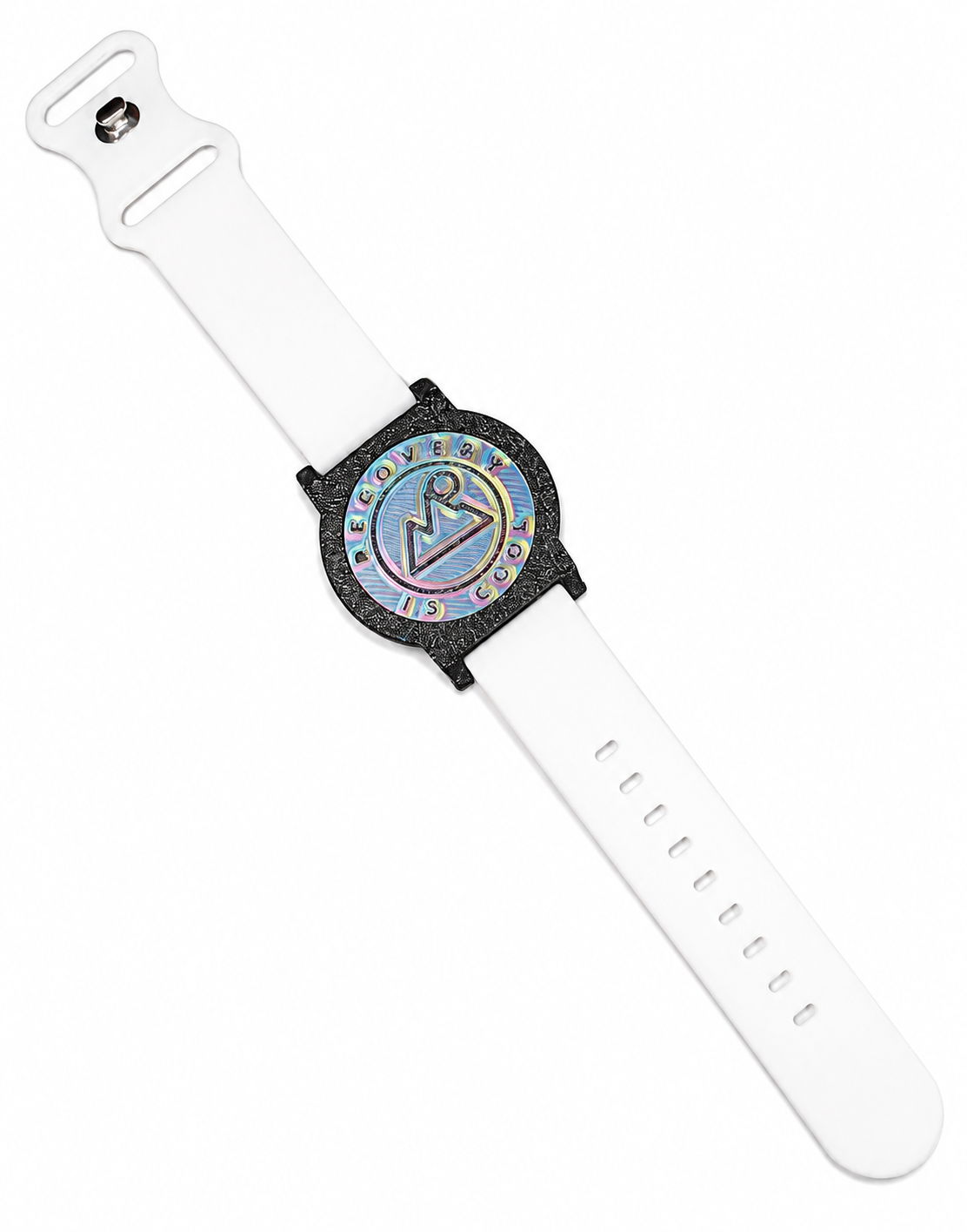 Recovewrist milestone band in white, worn watch-style with the iridescent ‘Recovery Is Cool’ recovery coin in a speckled granite bezel — made in Colorado